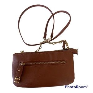 Charming Charlie crossbody bag . Camel color. Lots of compartments. Brass gold